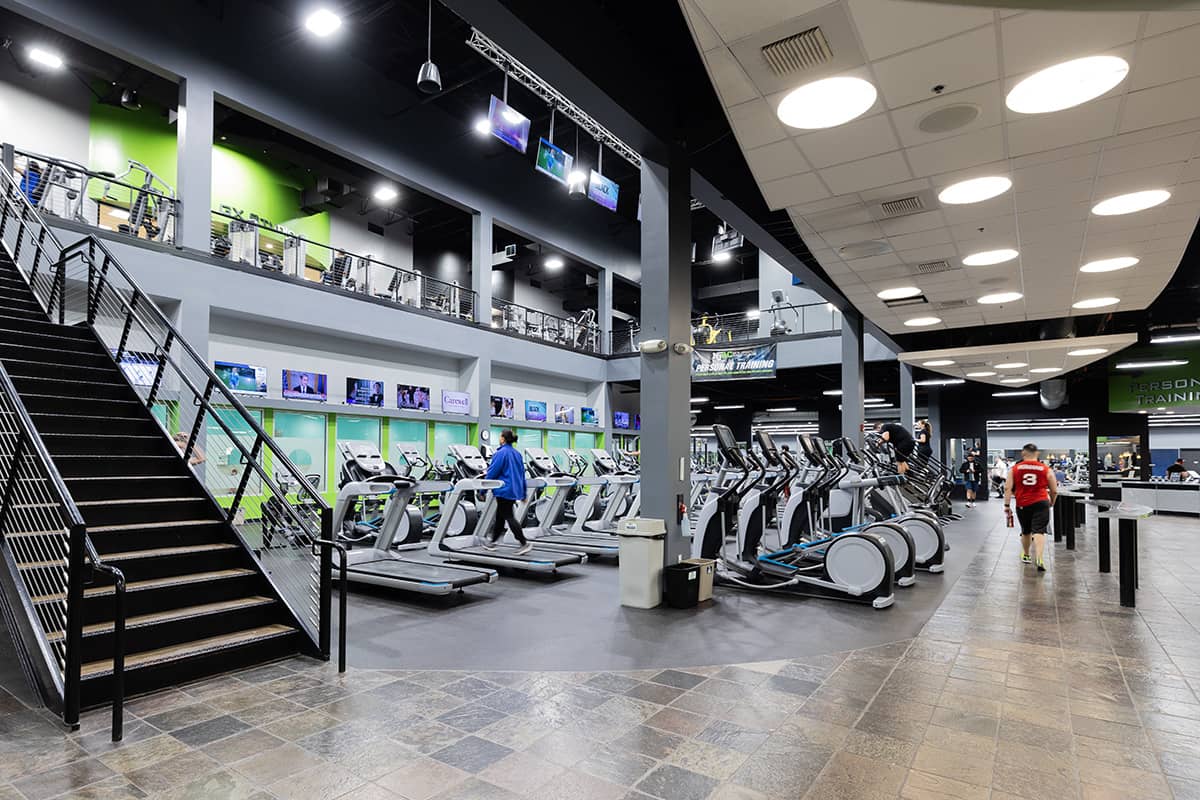 The cardio floor at NJAC with multiple treadmills and ellipticals.